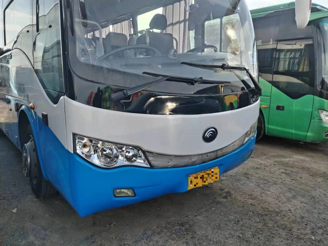 Youngtong 39 мест Подержанный автобус ZK6879 Лист весенний однодверный хороший кондиционер