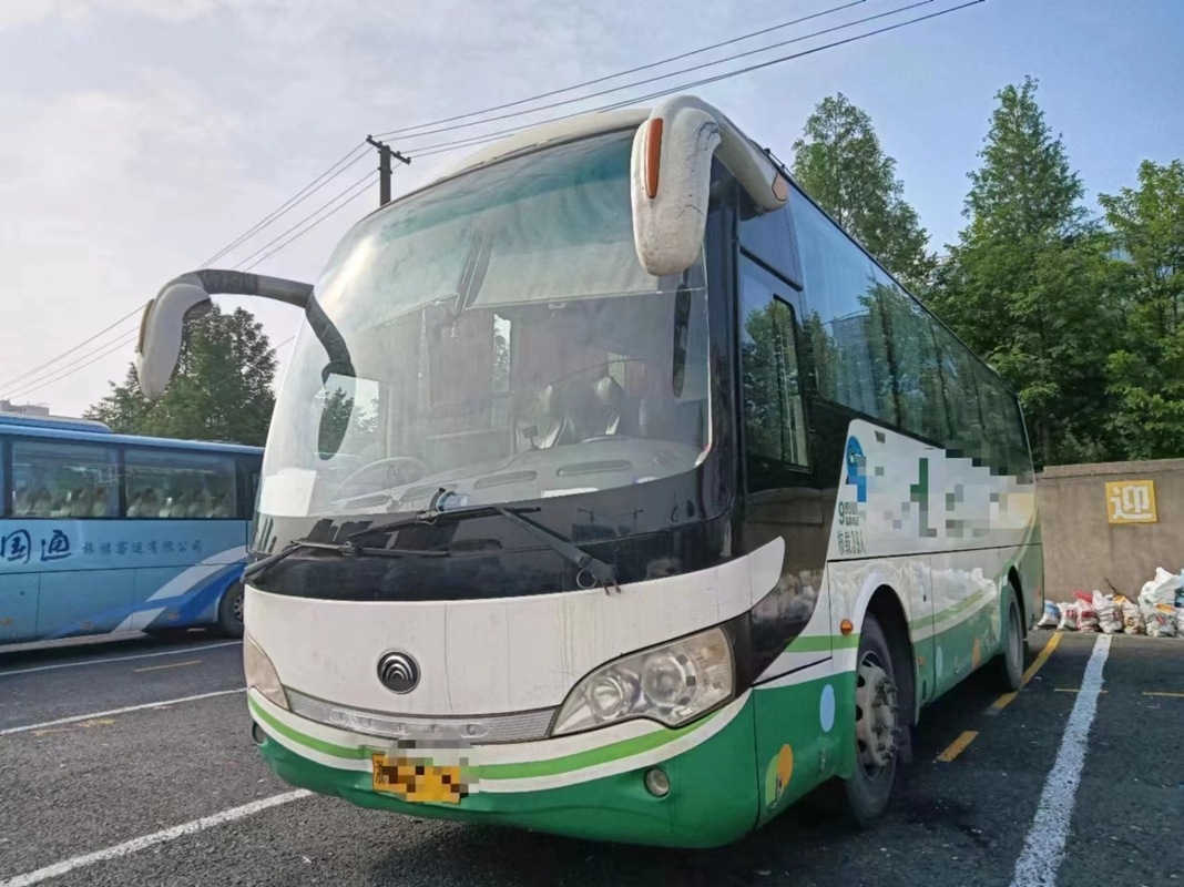 Подержанный пассажирский автобус Youngtong Bus ZK6908 Ручная коробка передач 39 мест 2016 Год длинной дистанции