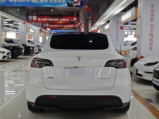 Доступный Подержанный Tesla Model Y SUV 2022 версия с подъемом к задним колесам для семейного использования