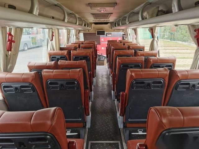 YOUNGMAN JNP6108 39 усаживает места воздушной подушки автобуса пассажира двигателя WP 199kw задним используемые автобусом выйденные шасси управляя кожаные