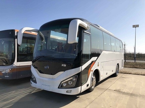 Автобус регулярного пассажира пригородных поездов двигателя зада привода Huang мини автобуса 34 мест правый